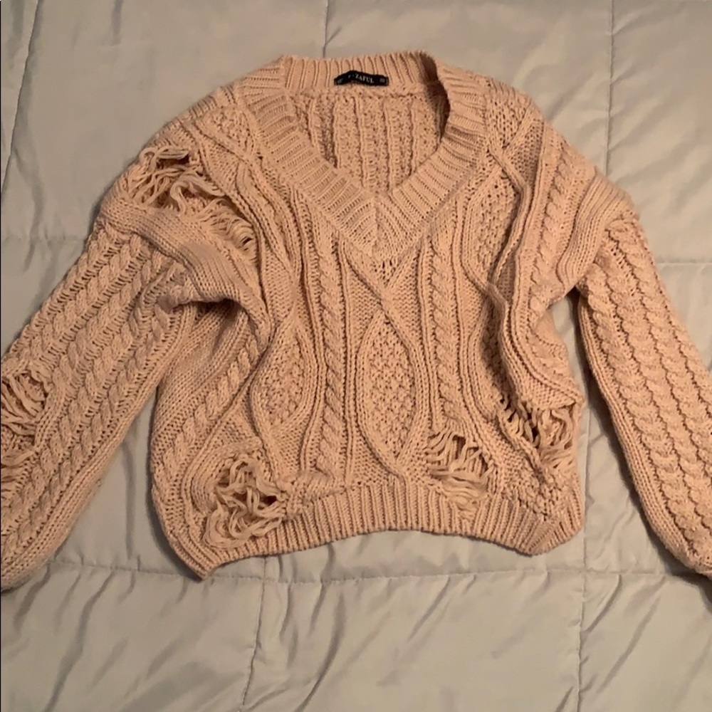Light pink sweater with holes
